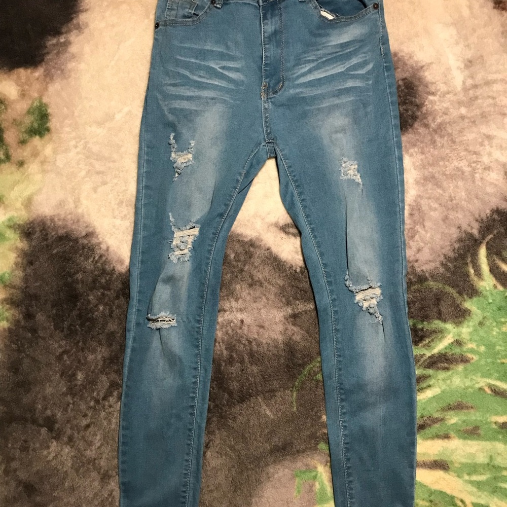Distressed Blue Denim Jeans